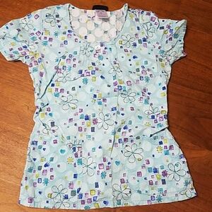 Cherokee Scrub top in Blue With Print Design In Gentlt Used Condition